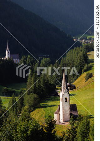 Scenic vertical  alpine view austrian mountain village Kals am Grossglockner valley blue clear sunrise morning sky background. Austria Apls osttirol National park nature. Summer autumn hiking tourism 117162666