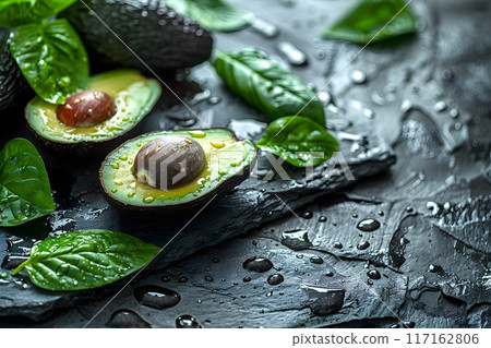 Fresh and Organic Avocado Halves with Basil Leaves on Slate Generative AI Fresh and Organic Avocado Halves with Basil Leaves on Slate Generative AI 117162806