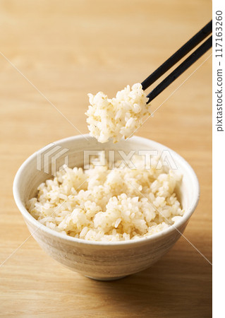 Whole rice served in a bowl 117163260