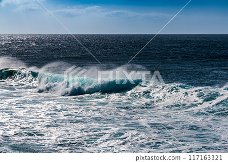 Surf waves of the ocean off the coast of the island of Lanzarote, Canary Islands 117163321
