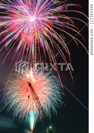 Midsummer fireworks decorating the night sky Midsummer fireworks decorating the night sky 117163344