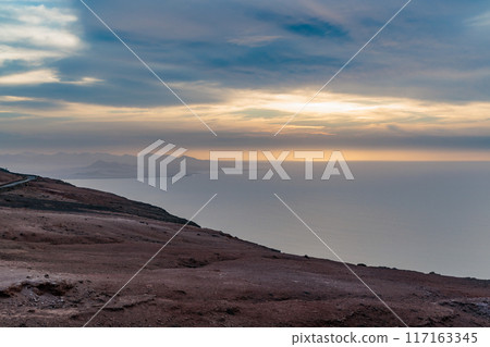 Sunset over the landscape around Mirador del Rio on the island of Lanzarote, Canary Islands 117163345