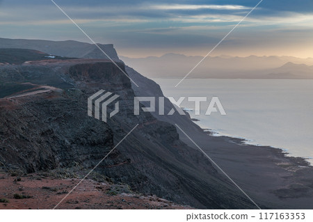 Sunset over the landscape around Mirador del Rio on the island of Lanzarote, Canary Islands Sunset over the landscape around Mirador del Rio on the island of Lanzarote, Canary Islands 117163353