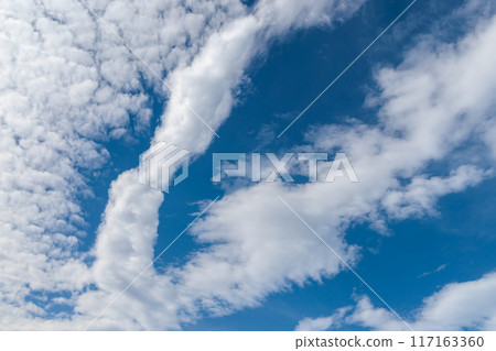 Clouds in the blue sky above the island of Lanzarote, Canary Islands 117163360