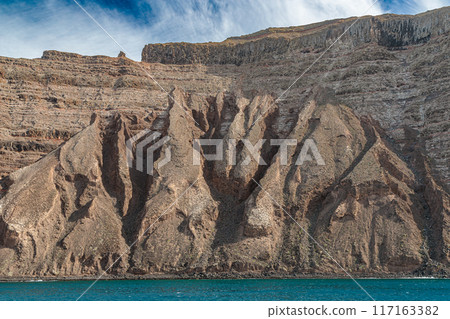 View from the boat of the northern volcanic coast of Lanzarote, Canary Islands 117163382