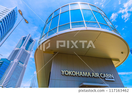 Yokohama cityscape in Japan, in front of Sakuragicho Station. View of Yokohama Air Cabin station building and Yokohama Landmark Tower, July 18th 117163462
