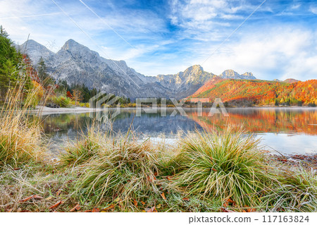 Fabulous autumn scene of sunny morning on Almsee lake. Fabulous autumn scene of sunny morning on Almsee lake. 117163824