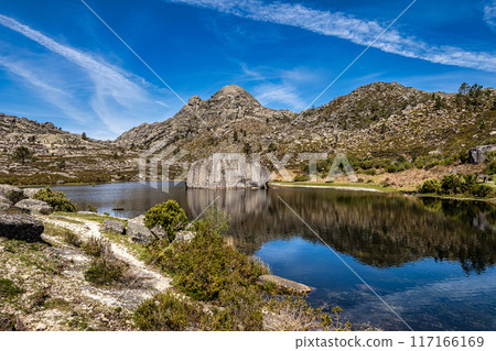 Beautiful lake at top of Penameda hill in national park Peneda Geres in Portugal. Beautiful lake at top of Penameda hill in national park Peneda Geres in Portugal. 117166169