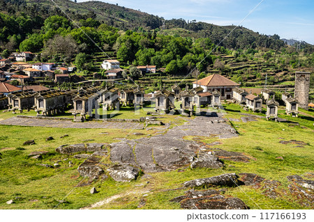 The communitarian granaries, called espigueiros, in the village of Lindoso, Peneda National Park, Northern Portugal 117166193