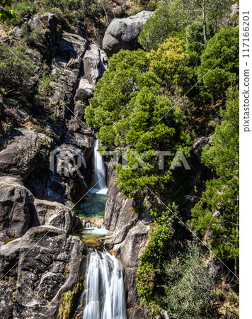 The beautiful Arado Waterfall, Cascata do Arado at the Peneda Geres National Park in Portugal, Europe 117166201