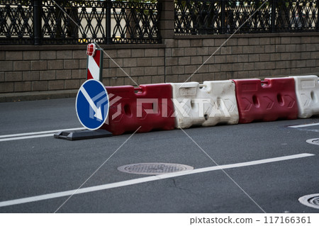 Road, temporary fencing with signs 117166361