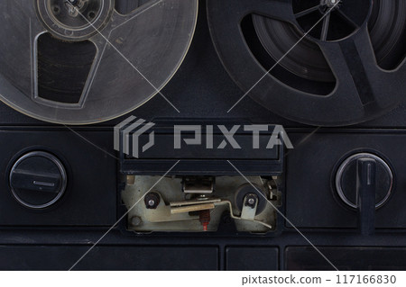 Close up an antique reel to reel tape recorder Close up an antique reel to reel tape recorder 117166830