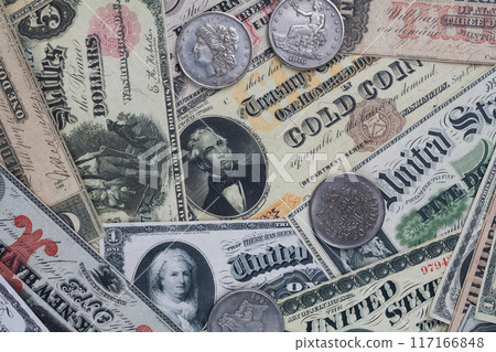 Old west US banknotes and silver certificates with silver dollar coins 117166848