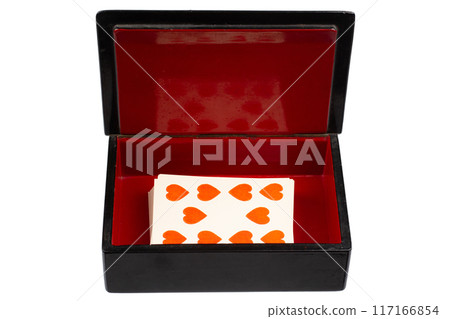 vintage old black and red casket with vintage playing cards 117166854