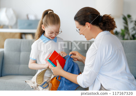 Happy family preparing for school Happy family preparing for school 117167320