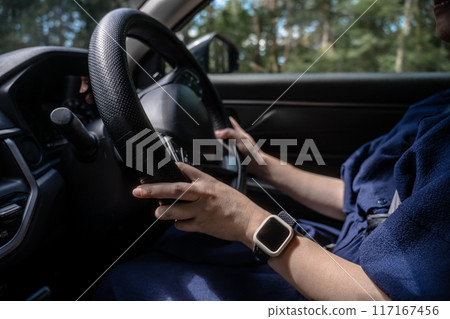 Woman driving a car Woman driving a car 117167456