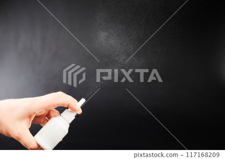 Nose spray in hand Nose spray in hand 117168209