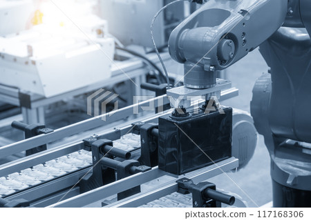 The material handling process by robotic arm in battery production line. 117168306