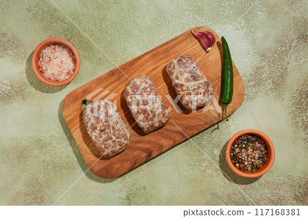 Overhead view of raw beef or lamb patties - Apkhazura Overhead view of raw beef or lamb patties - Apkhazura 117168381