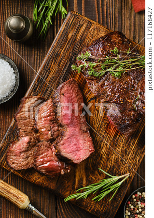 Close-up overhead view of grilled top blade beef steak 117168427