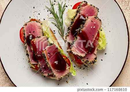 sandwiches with fried tuna fillet, sesame, breakfast, top view, homemade, sandwiches with fried tuna fillet, sesame, breakfast, top view, homemade, 117168610