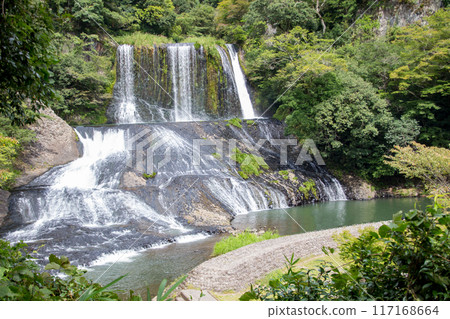 Fresh green dragon gate waterfall Fresh green dragon gate waterfall 117168664