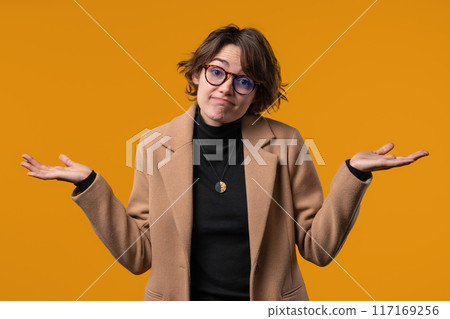 Can't help, dont know. Difficult question, guilty reaction,puzzled businesswoman Can't help, dont know. Difficult question, guilty reaction,puzzled businesswoman 117169256