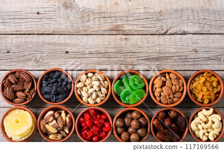 Mix of dried and candied fruits and nuts 117169566