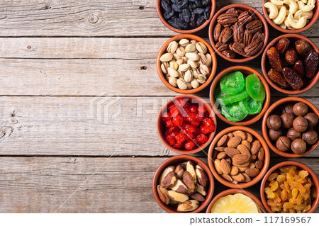 Mix of dried and candied fruits and nuts Mix of dried and candied fruits and nuts 117169567