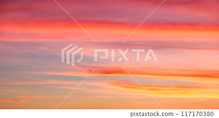 Colorful dusk embodying solitude; apt for inspirational backgrounds. Colorful dusk embodying solitude; apt for inspirational backgrounds. 117170380