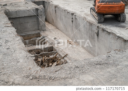 Heavy machinery and underground pit demolition work 117170715