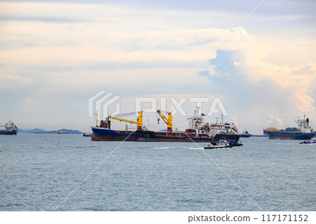 General Cargo and Oil Products Tanker Ship is anchored in Singapore Strait. 117171152