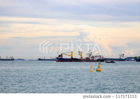 General Cargo and Oil Products Tanker Ship is anchored in Singapore Strait. General Cargo and Oil Products Tanker Ship is anchored in Singapore Strait. 117171153