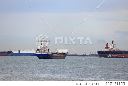 Large Container Ship anchored in Singapore Strait. Large Container Ship anchored in Singapore Strait. 117171155