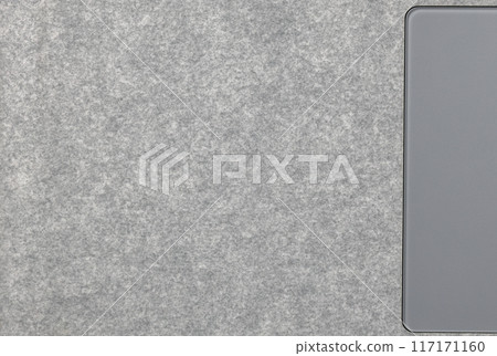 Close up Grey synthetic textile, Alcantara texture use on premium computer notebook. Surface of leatherette for textured background. Close up Grey synthetic textile, Alcantara texture use on premium computer notebook. Surface of leatherette for textured background. 117171160
