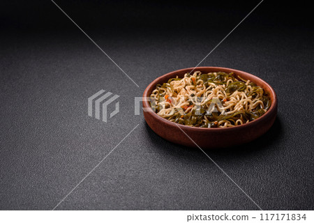 Asian dish rice noodles with salt and spices 117171834