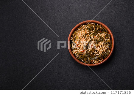 Asian dish rice noodles with salt and spices Asian dish rice noodles with salt and spices 117171836
