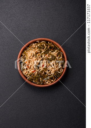 Asian dish rice noodles with salt and spices 117171837