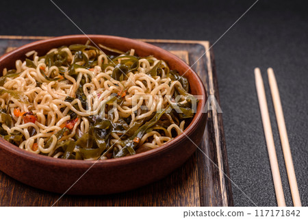 Asian dish rice noodles with salt and spices Asian dish rice noodles with salt and spices 117171842