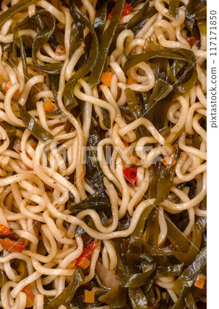Asian dish rice noodles with salt and spices 117171850