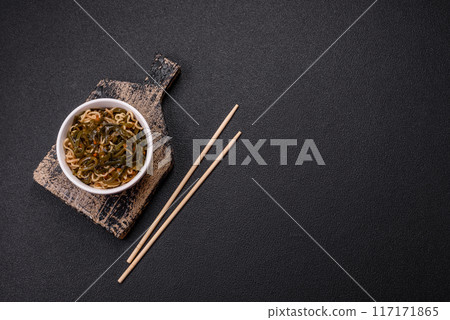 Asian dish rice noodles with salt and spices 117171865
