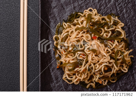 Asian dish rice noodles with salt and spices 117171962