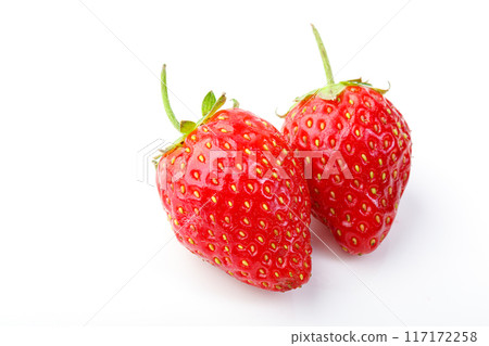 beautiful and ripe red strawberries on a white background beautiful and ripe red strawberries on a white background 117172258