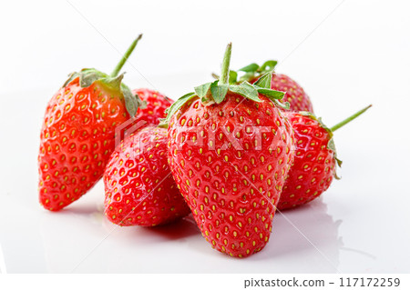 beautiful and ripe red strawberries on a white background 117172259