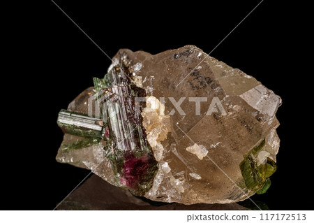 Macro stone tourmaline mineral on a black background Macro stone tourmaline mineral on a black background 117172513