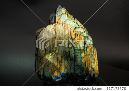 macro mineral stone labradorite on a black background macro mineral stone labradorite on a black background 117172578