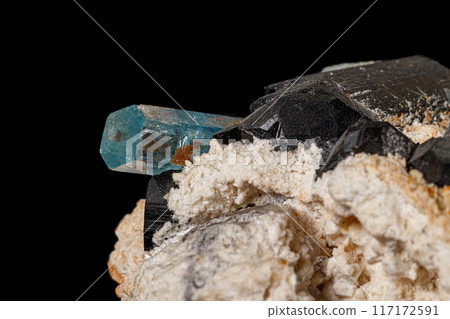 Macro stone mineral tourmaline aquamarine with a black background 117172591