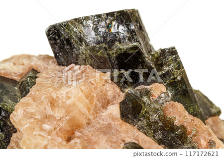 Macro of a mineral stone Vesuvianite on a white background Macro of a mineral stone Vesuvianite on a white background 117172621