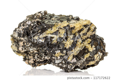 Macro of a mineral stone Vesuvianite on a white background 117172622