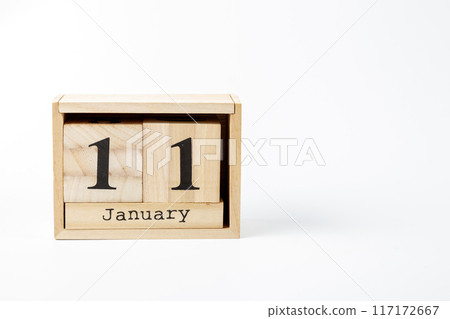 Wooden calendar January 11 on a white background Wooden calendar January 11 on a white background 117172667